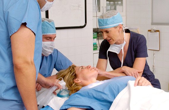 Los Angeles Breast reduction surgeon with patient